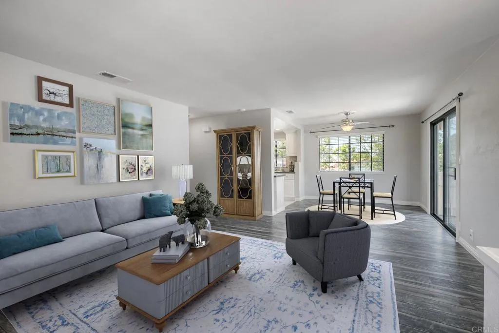 Virtually staged living and dining area~