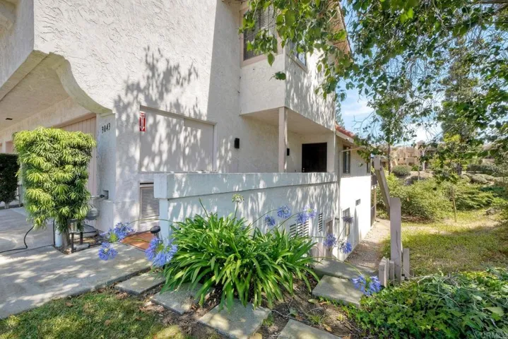 Staircase to the right of building leads to secure storage space.