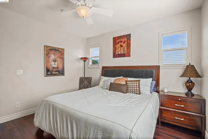 Hardwood-finish flooring enhancing a neutral-toned room with white baseboards and trim