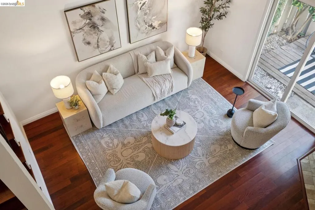 Hardwood flooring throughout a spacious living​​‌​​​​‌​​‌‌​​‌​​​‌‌​​​‌​​‌‌​​‌‌​​‌‌​​​​ area