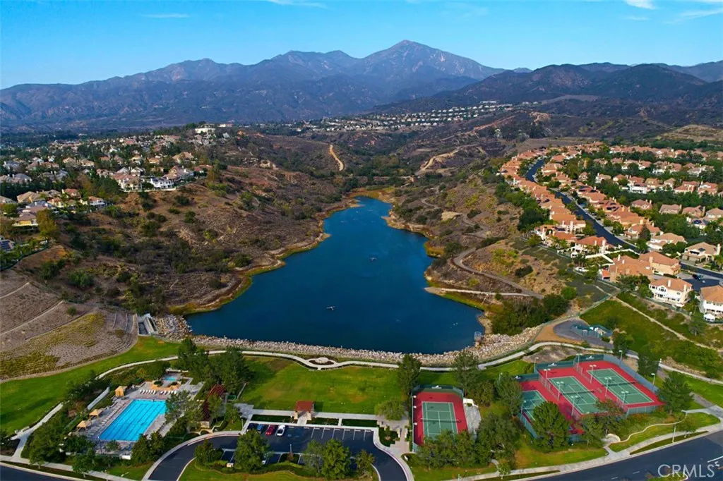 Aerial of Pool, Tennis Courts, and Reservoir