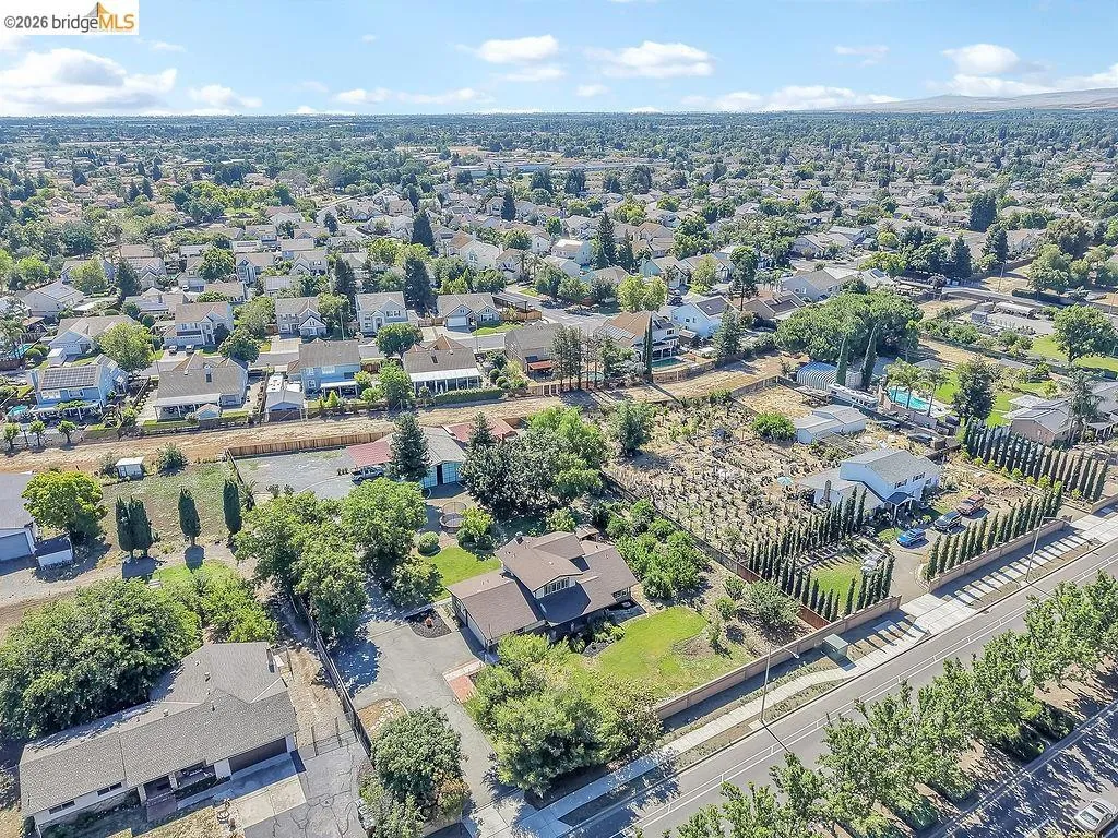 Aerial perspective showcasing a residential area with varied housing styles
