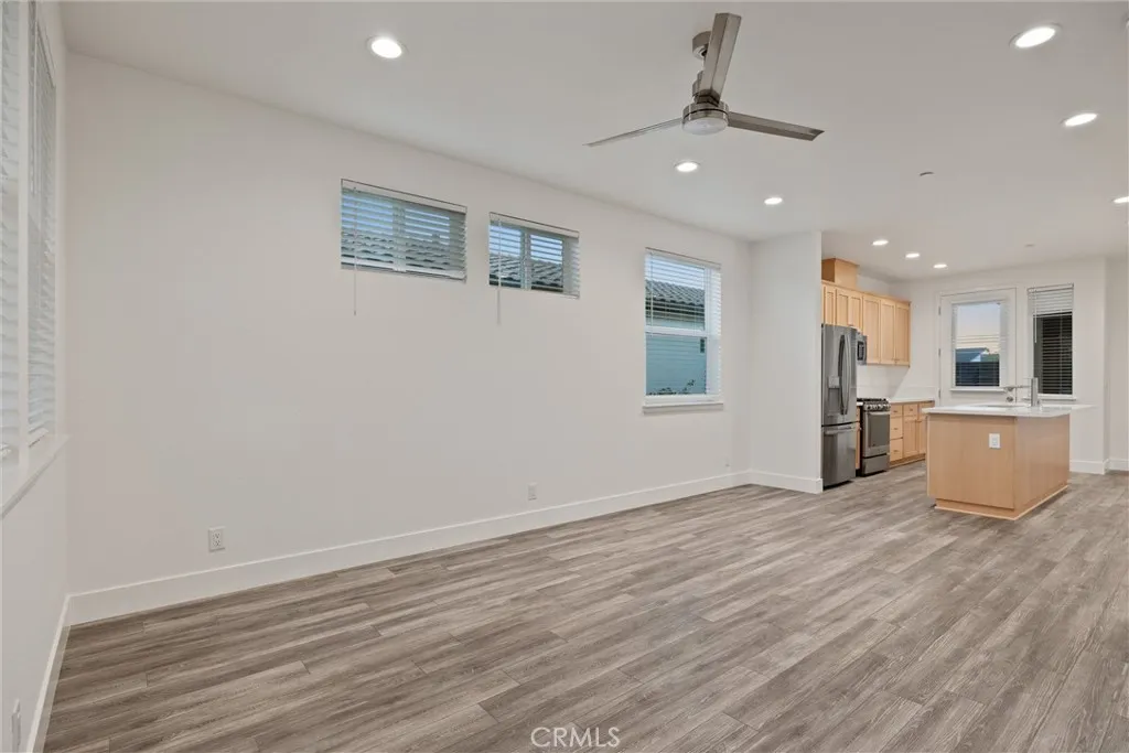 Main House Living + Kitchen. Photo taken prior to tenant occupancy.