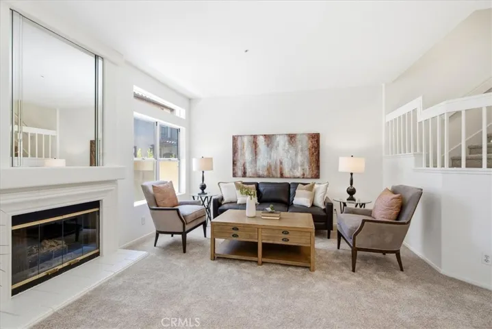 Alternate angle of living room highlighting open layout and natural light.
