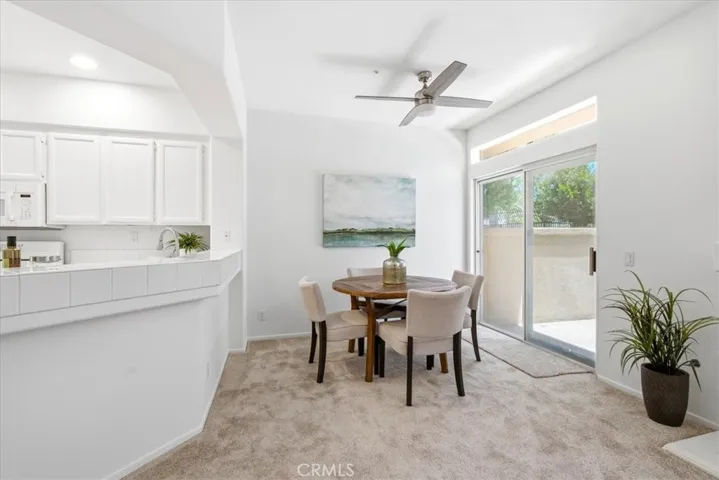 Open kitchen and dining area with modern finishes and seamless flow.