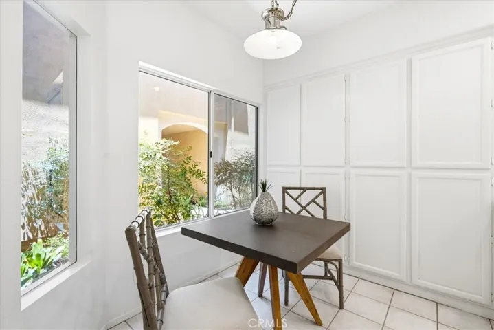 Dining nook with natural light and functional layout.