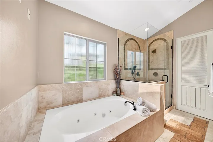 Master bathtub and shower.