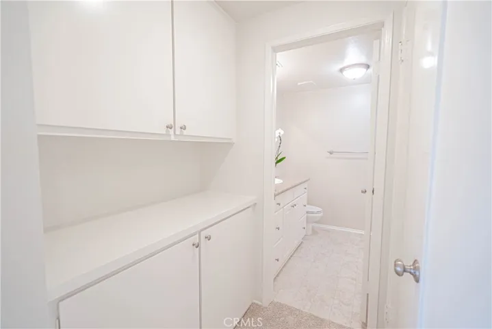 hallway leading to 2nd bathroom