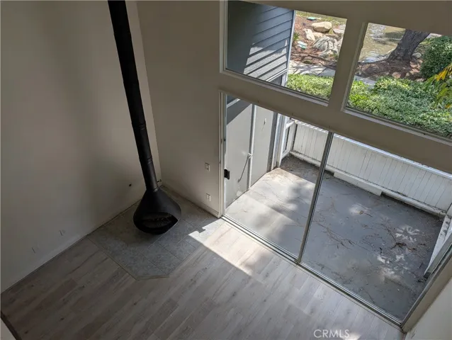 Laundry area is outside this door in closet with room for side by side appliances