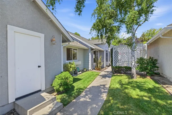 Access from garage to home, mature landscaping