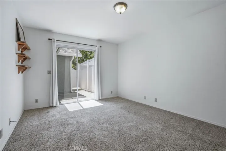 Guest bedroom, sliding door access to exterior patio