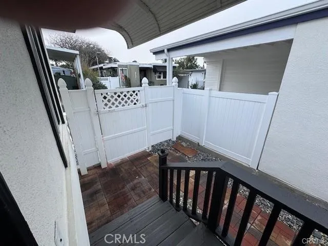 Stairs to the front door
Gated from the street