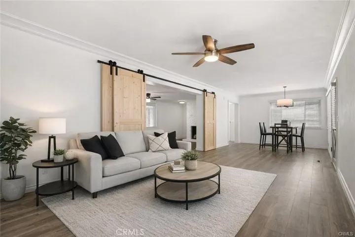 View of dining & living with opening to the 2nd bedroom