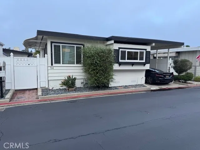 Front view with carport
