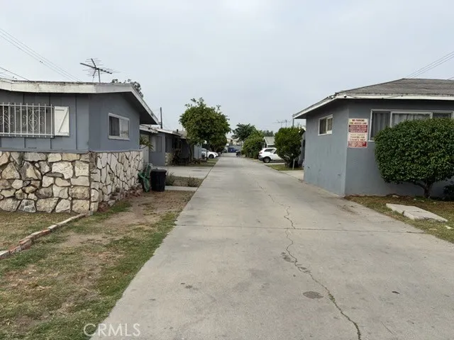 View from the front sidewalk directly to the back of the property.