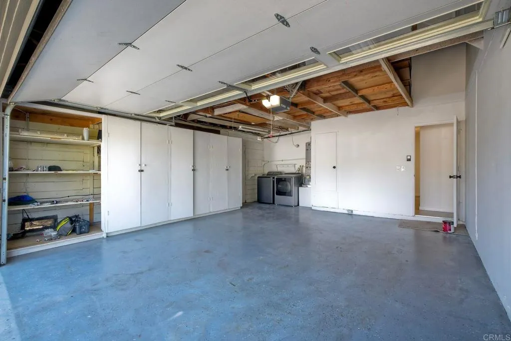 Attached garage w/laundry and storage.