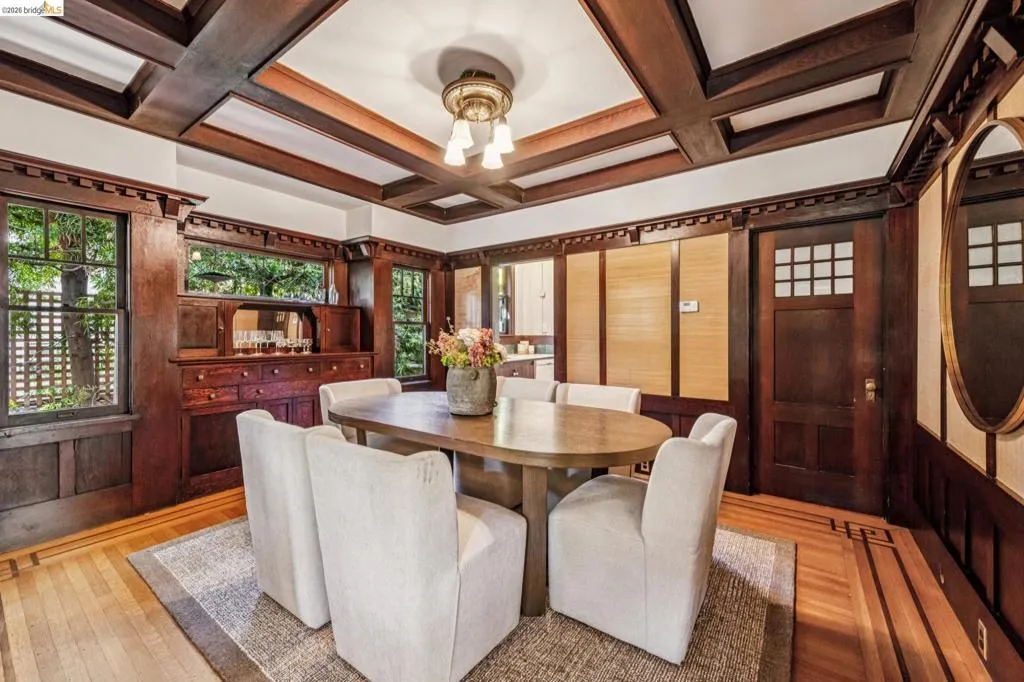 Craftsman-style interior featuring rich wood-finish trim and wainscoting