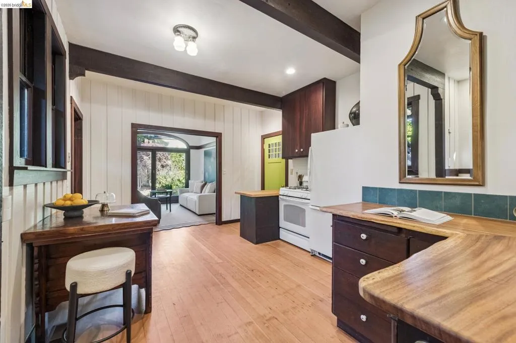Rustic, french provincial styled eat-in kitchen is a great place to visit with friends while preparing a meal.
