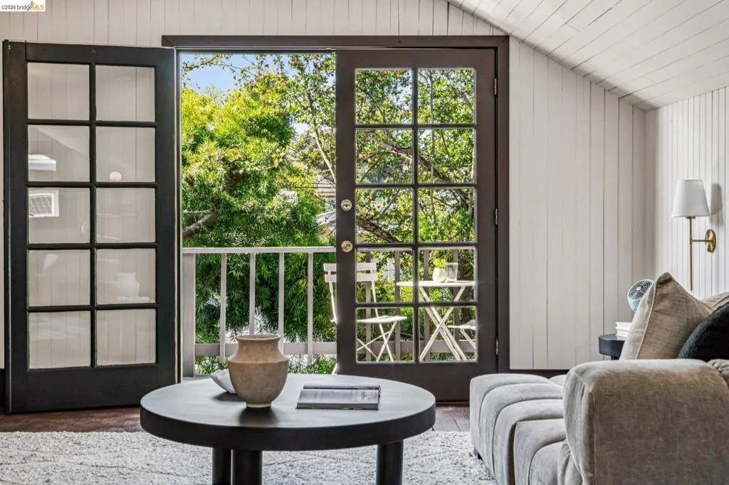 French doors wopening out to the deck from the attic.