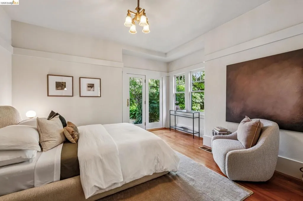 Primary bedroom opens out to the backyard.