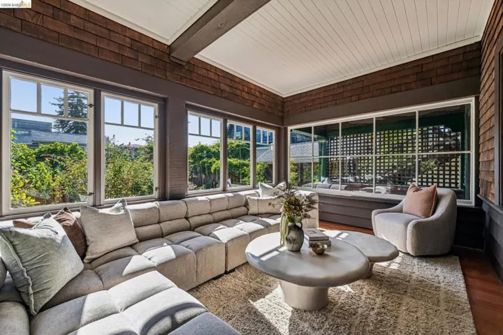 The sun room is the place to be!  Overlooking the front garden this is the ultimate place to curl up with a book or a loved one.