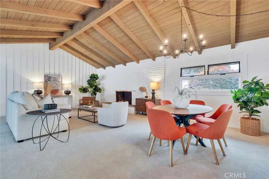 Living and dining room with vaulted ceilings