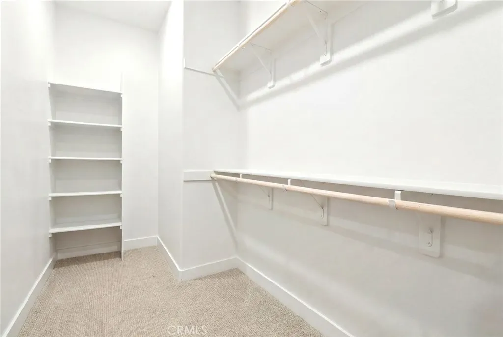 large walk in closet had belongings ditigally removed.