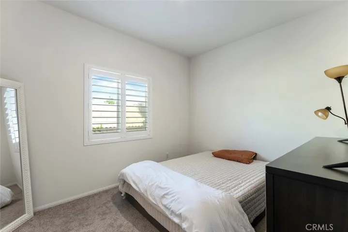 Bedroom #2 w/ walk-in closet.