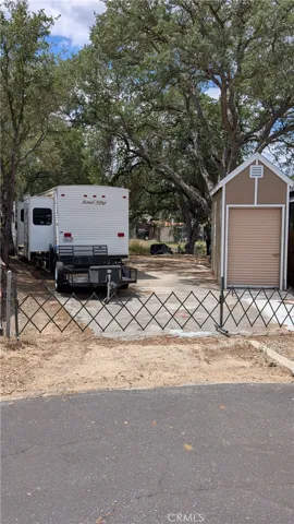 Street view showing room for 2nd RV. Note shade trees