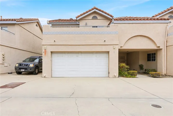 Exterior with attached 2 car garage