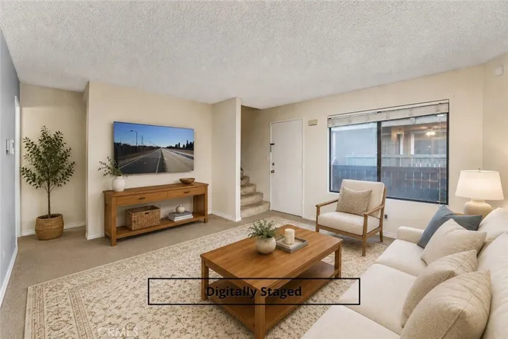 Great setup with combined family / living room open to dining & kitchen. Virtually staged & ready for your creativity!