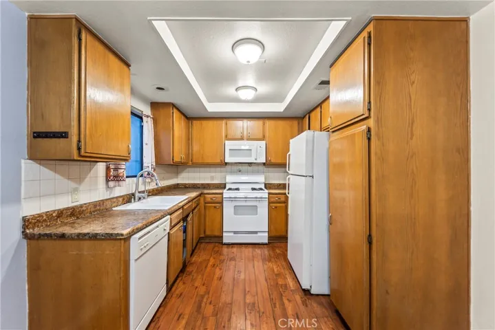 Lots of cupboards, mounted microwave, & gas range for cooking