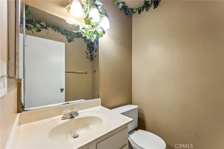 Main floor half bath - so convenient for guests!