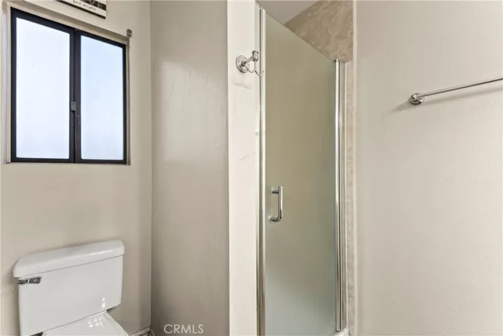 Walk in shower in primary bath 1