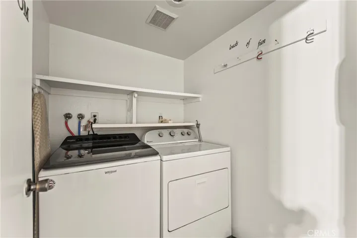 Main floor laundry room adjoins kitchen