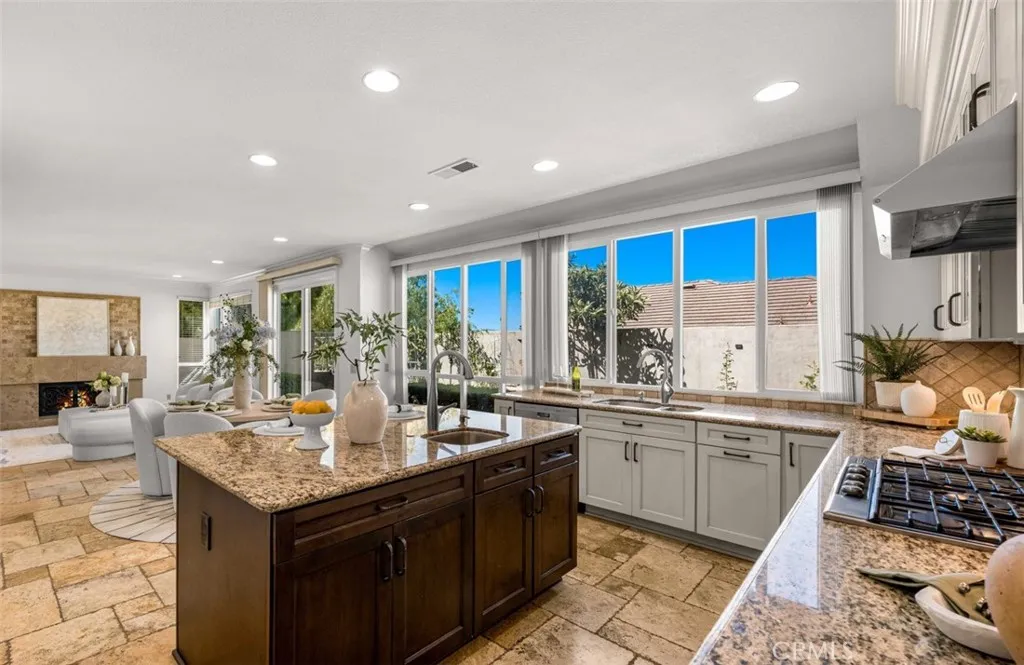 Expensive travertine tile flooring in kitchen