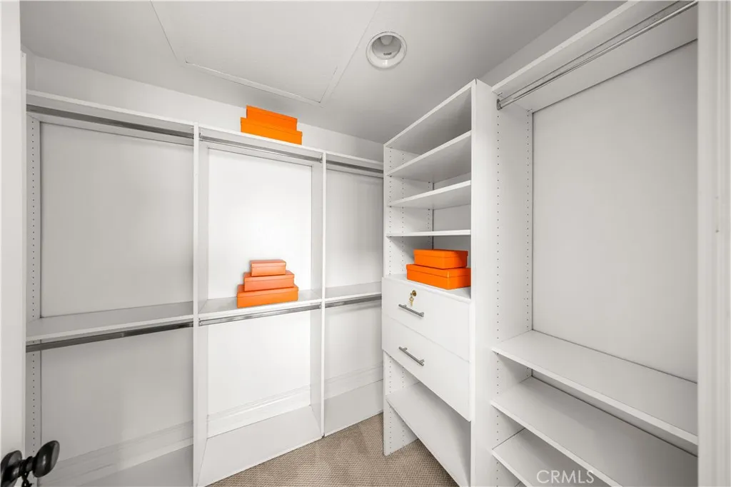1 of the 2 spacious walk-in closets