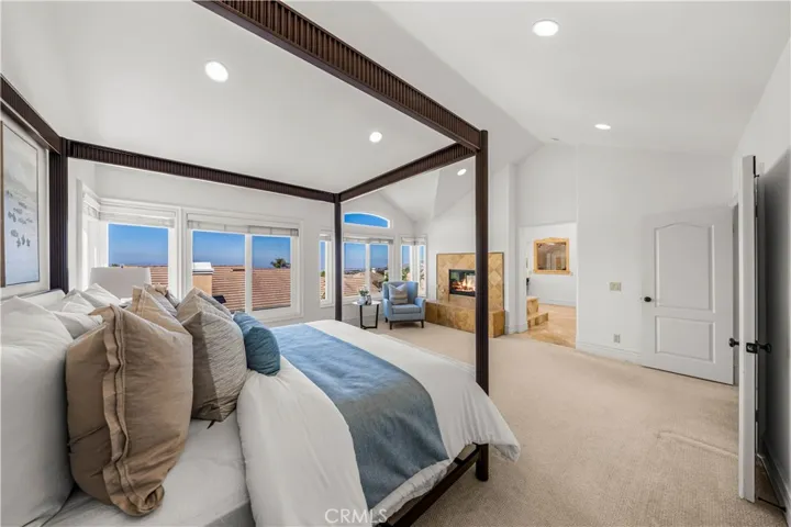 Cozy fireplace in primary bedroom