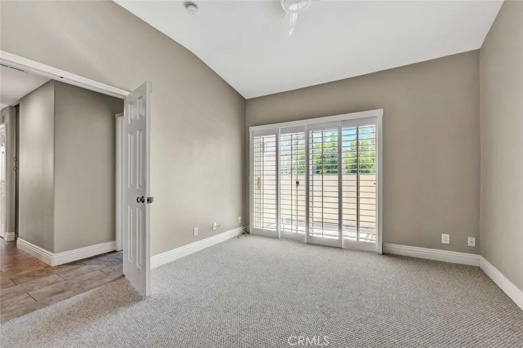 Primary bedroom with private balcony, newlit installed carpert,