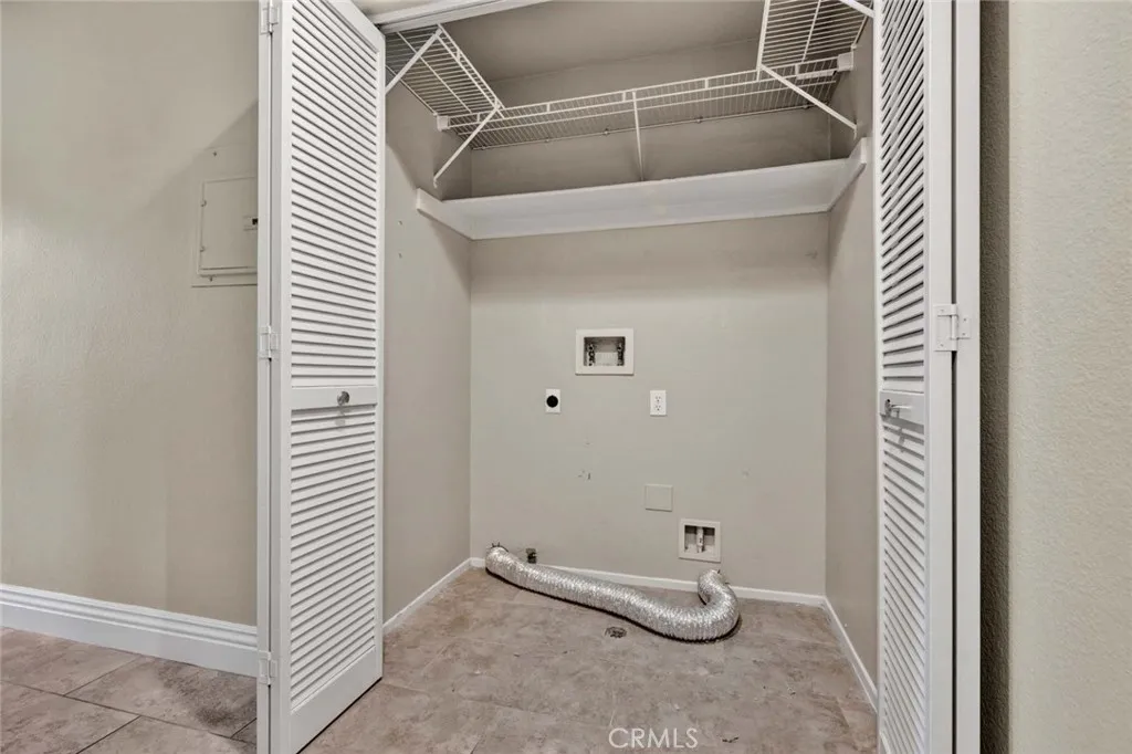 Convenient, full-sized laundry closet located on the upper level.