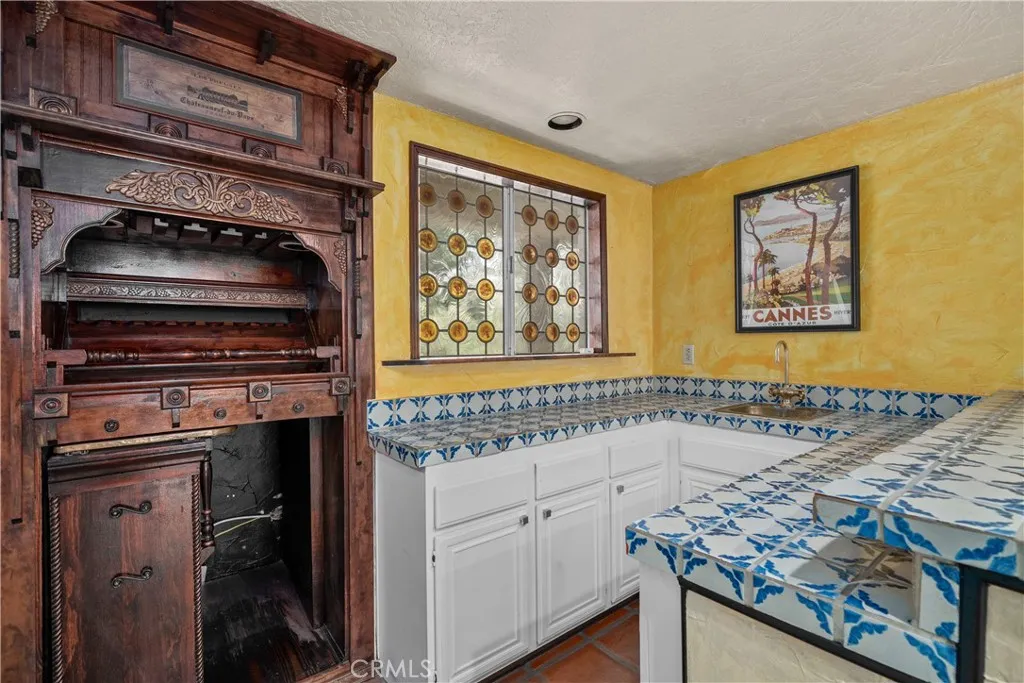 European style wet bar with built-in French wine storage
