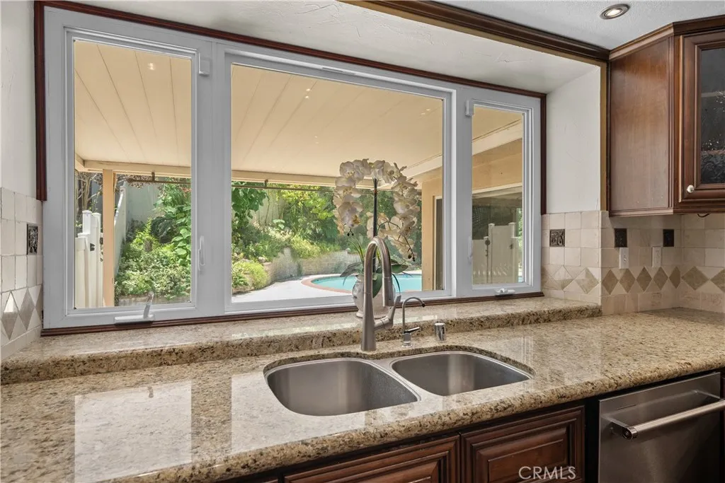 Kitchen window with pool view