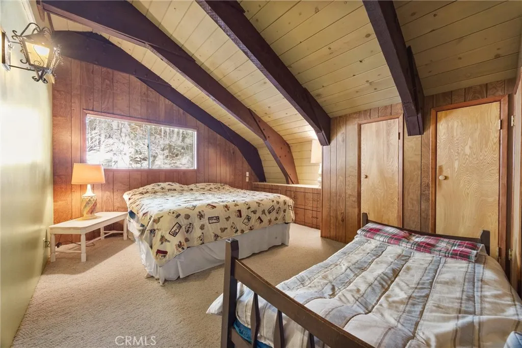 Large primary bedroom, with closets and built-in drawers.