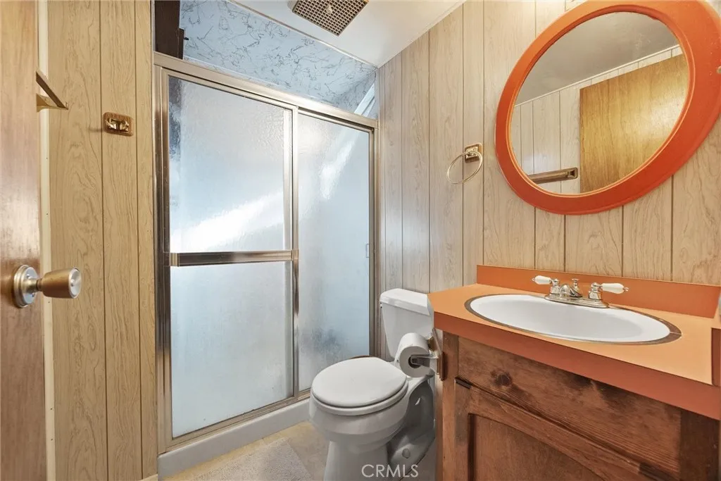 Primary bathroom upstairs with walk-in shower.
