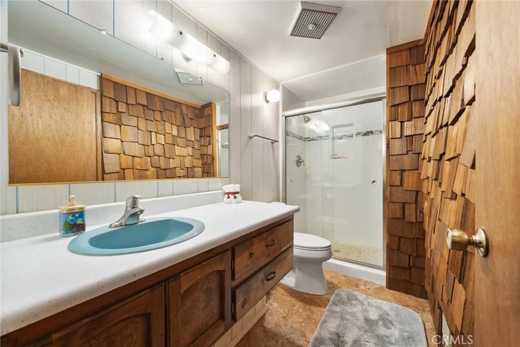 Bathroom with access from hallway and bedroom #1.  Renovated recently.