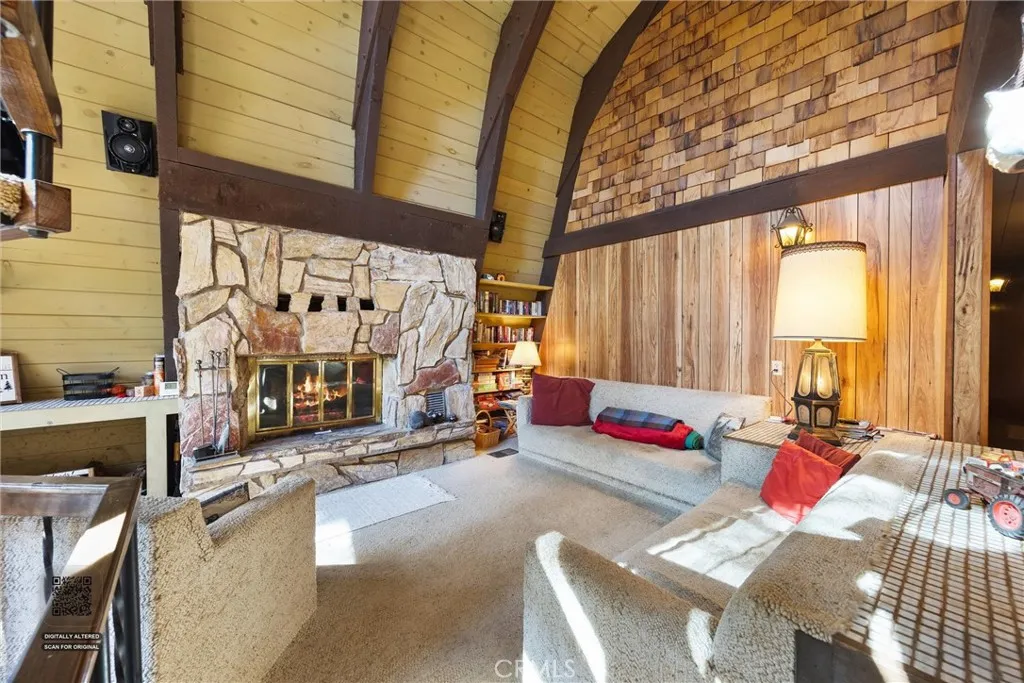 Living room with massive fireplace