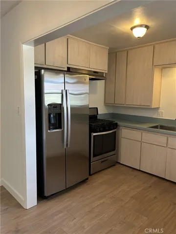 Kitchen with Fridge and Stove