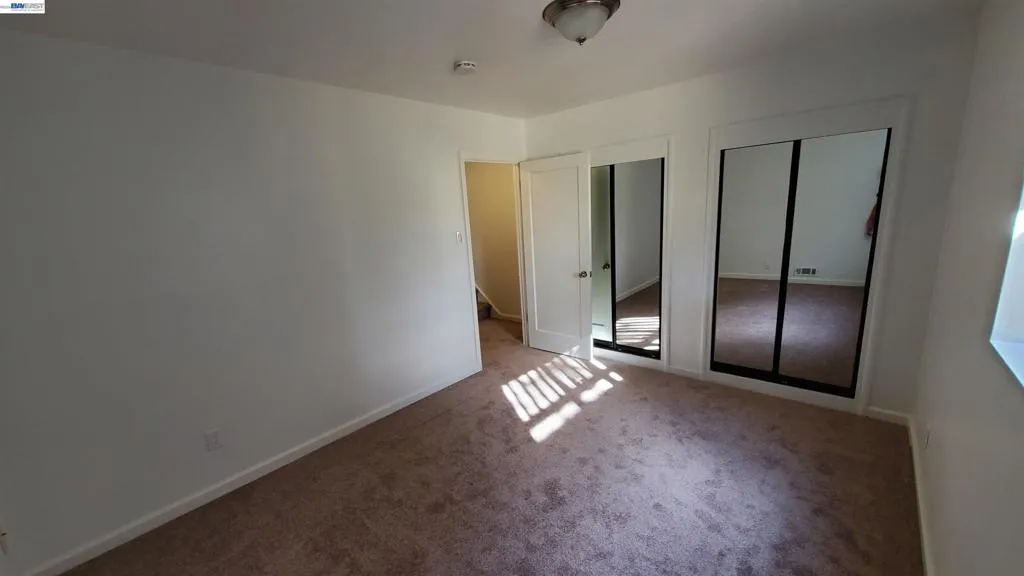 Downstairs bedroom. Historical photo for reference.