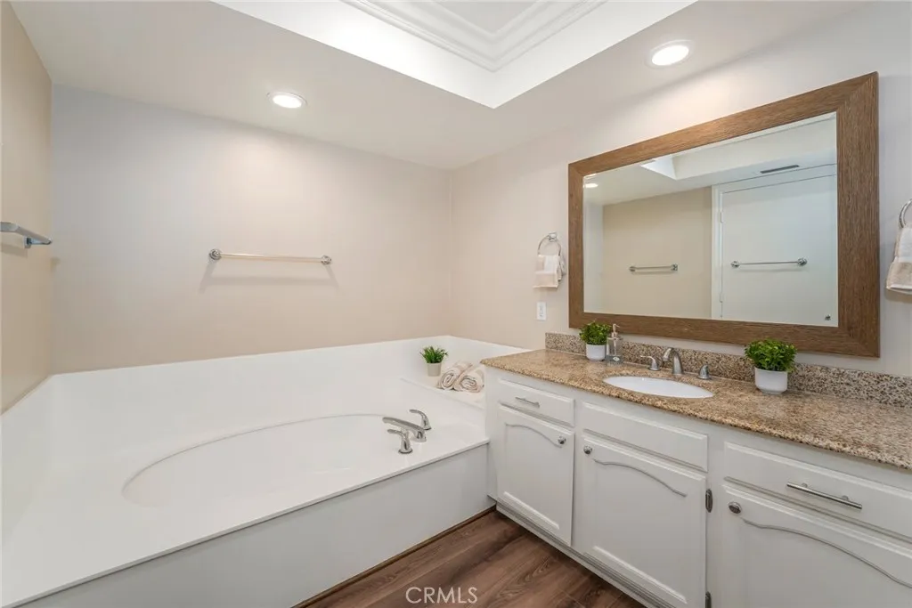 Full soaking bath in primary bathroom.
