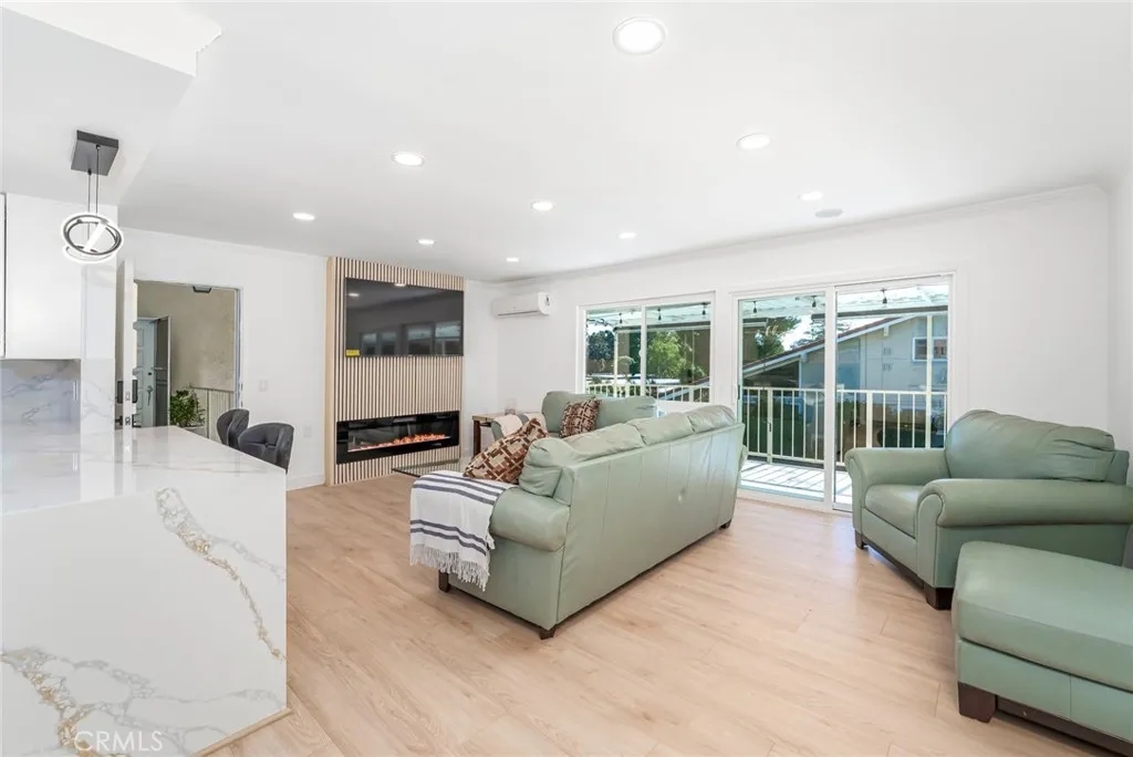 70" TV Included with an electric fireplace for some ambiance!